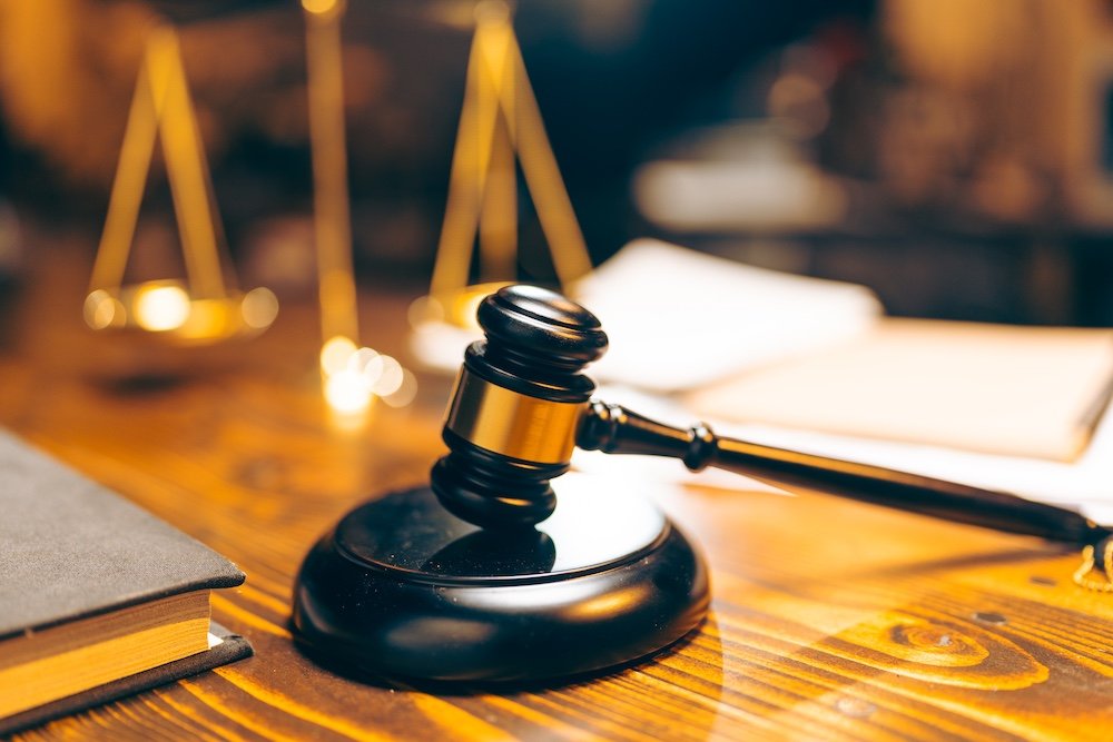 Law and authority concept with judge's gavel in courtroom symbolizing justice, legislation, and criminal verdicts