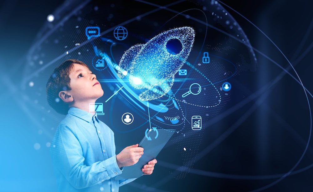Kid boy using digital tablet with blue HUD showing rocket launch and icons, concept of future opportunities and education